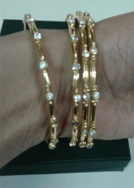 gold bracelets with stones1.jpg